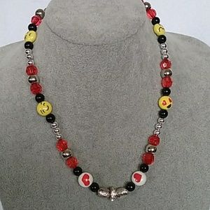 Yellow, red, & black emoji beaded necklace